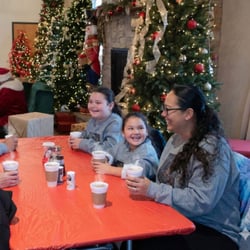 families enjoying Santas Workshop at the Christmas Carnival of Lights families enjoying Santas Workshop at the Christmas Carnival of Lights